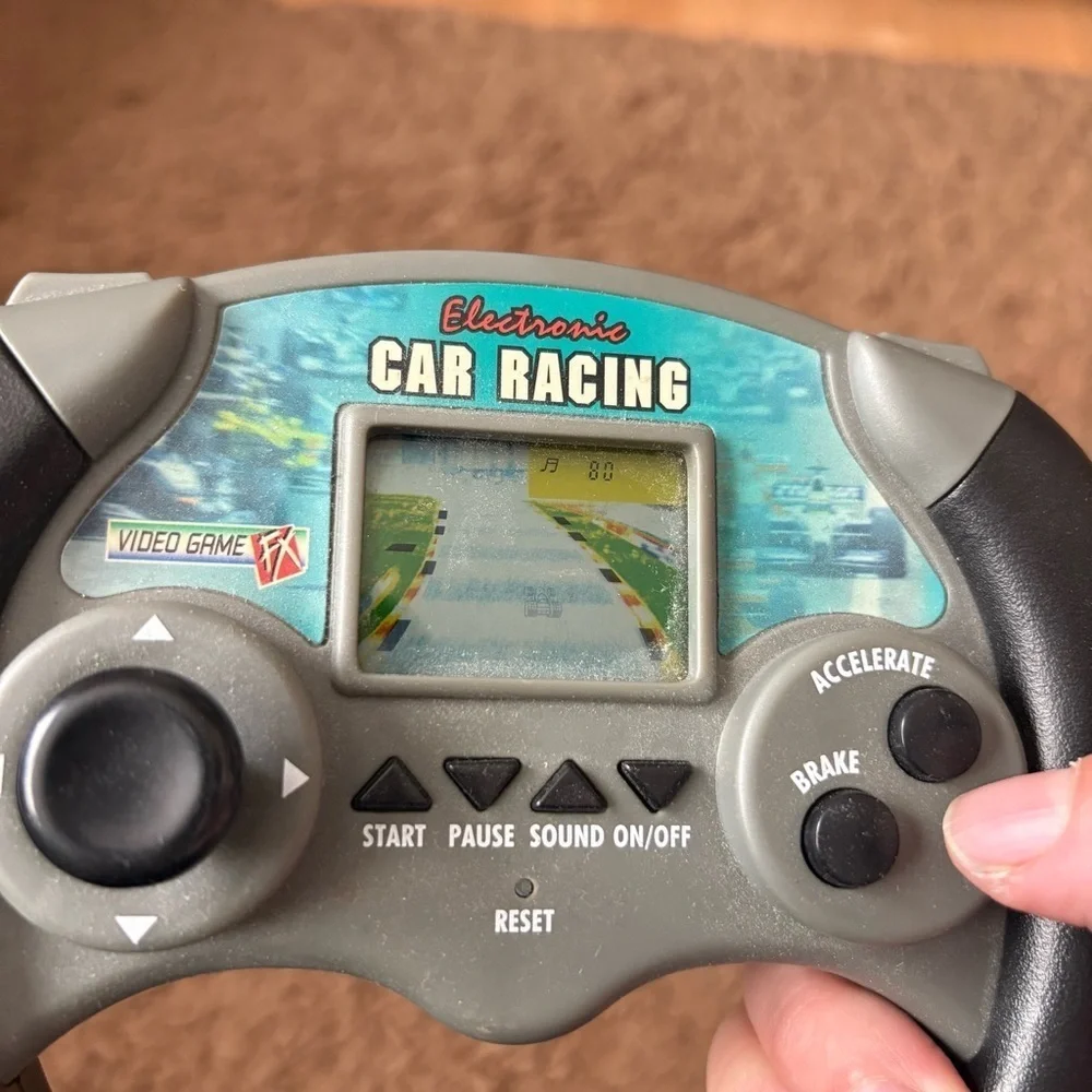 Toy Quest: Electronic Car Racing FX Handheld Video Game Tested and working